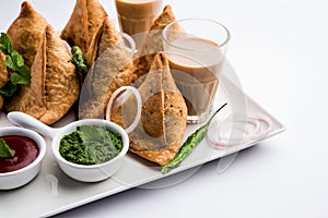 SamosaÂ Snack is an Indian deep fried pastry with a spiced filling usually made with potatoes, spices and herb